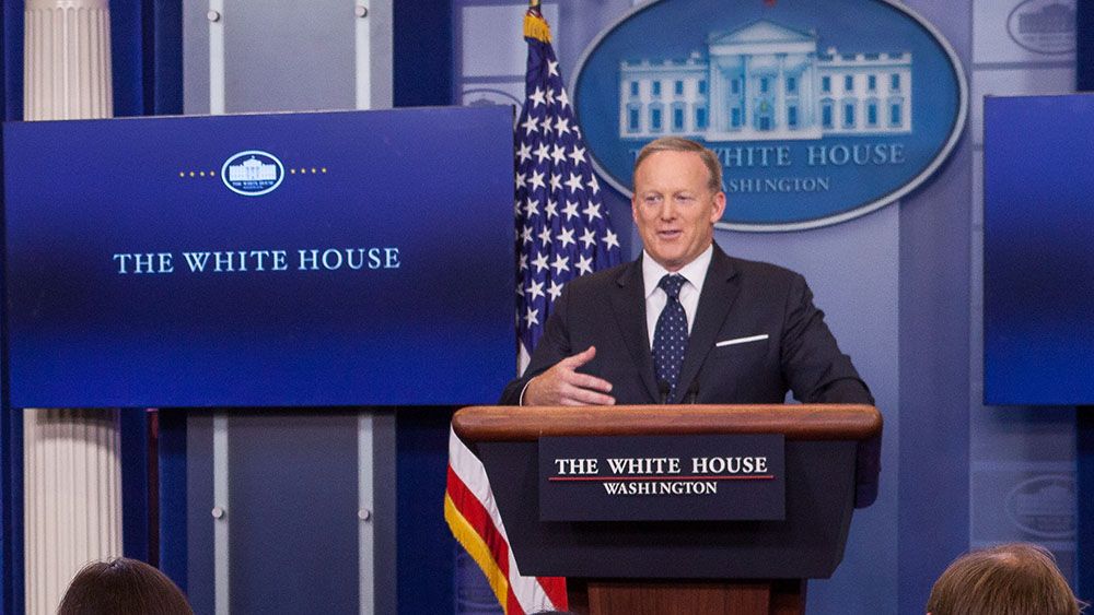 White_House_press_secretary_Sean_Spicer_listens_as_Jake_Turx_asks_a_question_at_a_press_briefing.jpg