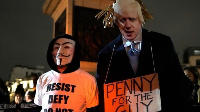 «Гори, Борис, гори». Как в Лондоне прошел антиправительственный «Марш миллиона масок»